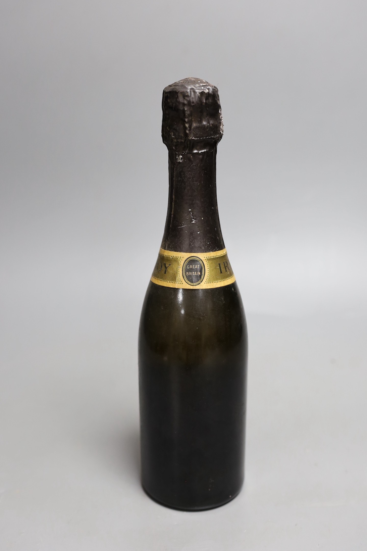 A half bottle of Ernest Irroy champagne with a Union Jack flag